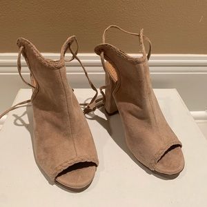 Heel height: 4inch. Tie back enclosure